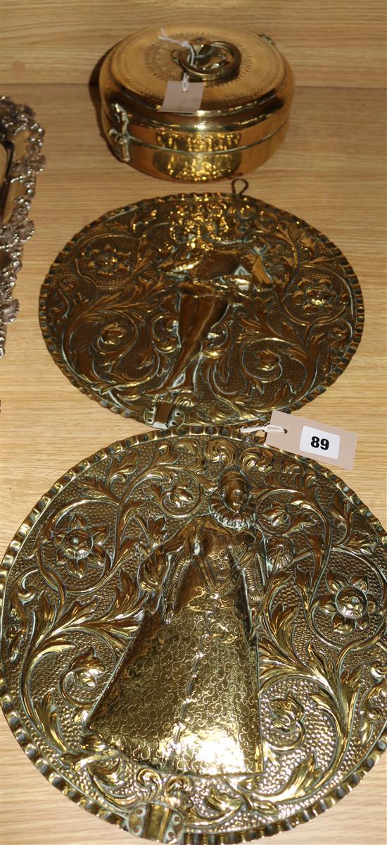 A pair of 17th century Dutch embossed brass wall sconces (lacking candle arms) and an Indian brass spice box